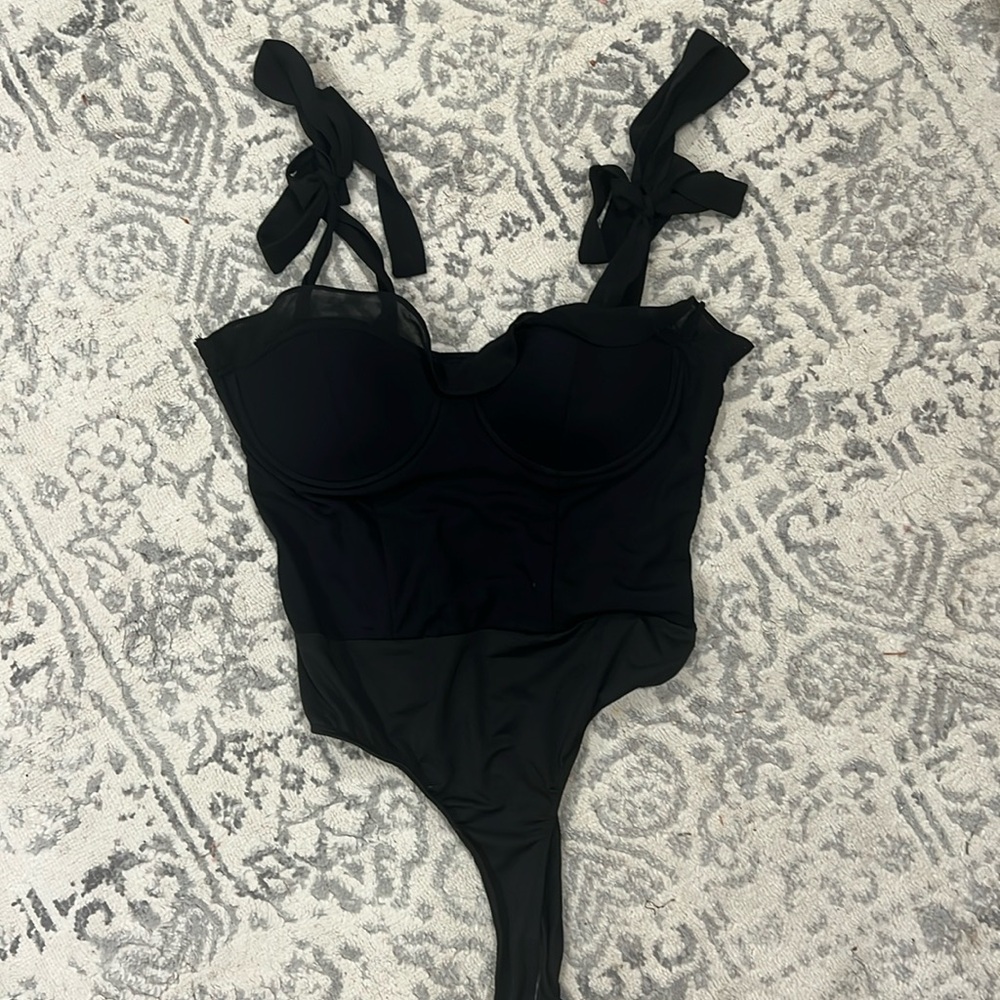 Lulu’s size medium bodysuit worn once or twice!